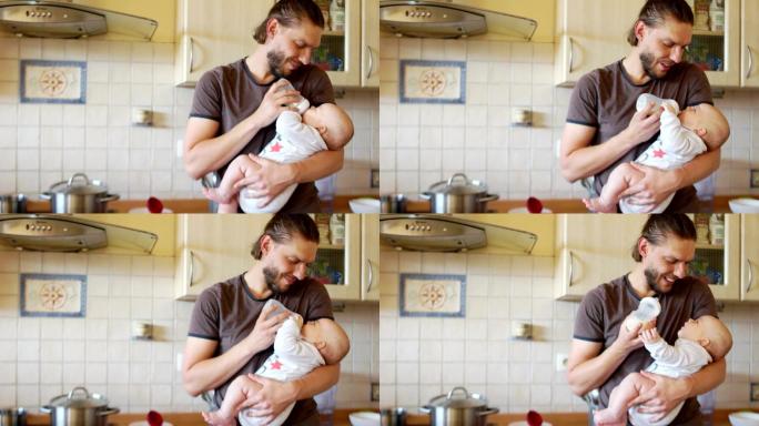 婴儿急切地喝着父亲手中的牛奶