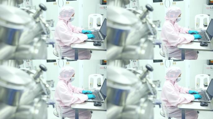 科学家正在生物实验室用显微镜检测冠状病毒