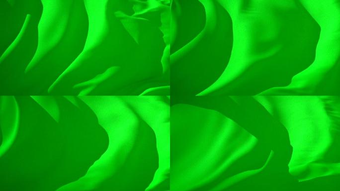 绿色纺织面料在风中飘动