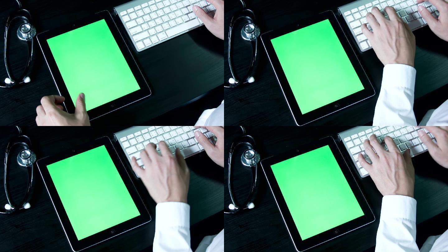 医生双手操作数字平板电脑，色度键