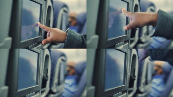 婴儿在飞机上使用触摸屏
