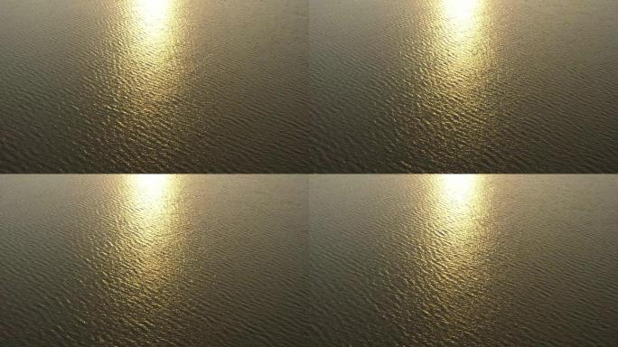 金色波光粼粼的大海航拍4K