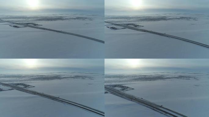 冬季广阔朝阳公路雪地航拍空镜