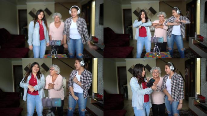 祖母和孙女在跳舞幸福家庭陪伴老人时髦老人
