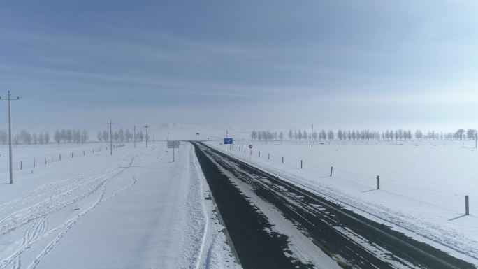 冬季广阔震撼公路雪地航拍空镜