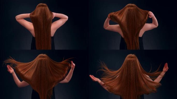 美丽的红发女人甩着长长的头发