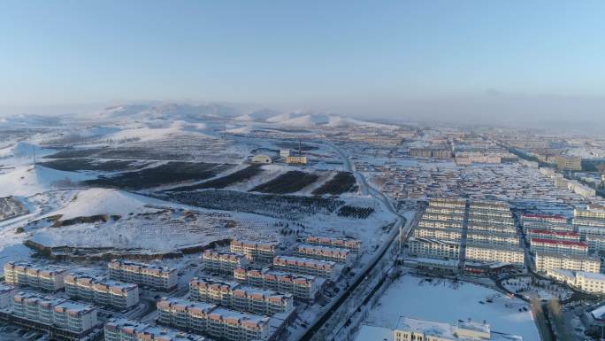 冬天冬季雪地航拍小镇城市雪山内蒙古空镜