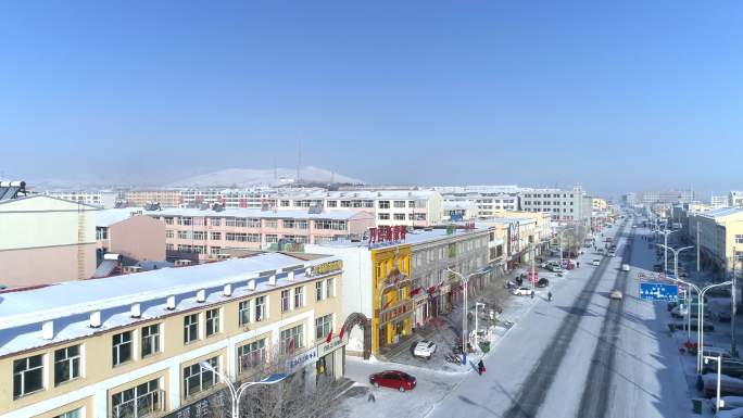 航拍空镜内蒙古北方小镇冬季雪景雪后