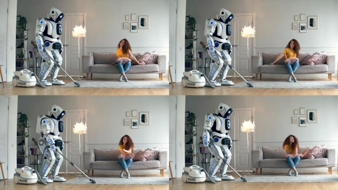 一个女人坐在沙发上，机器人在清理地板。