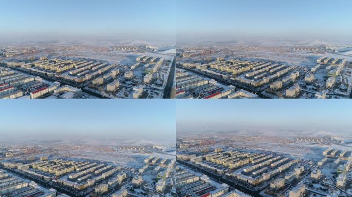 冬天冬季雪地航拍小镇城市雪山内蒙古空镜