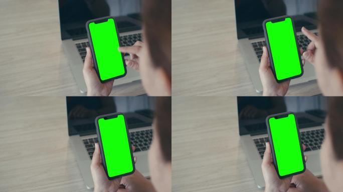 女性使用智能手机绿色屏幕可抠像