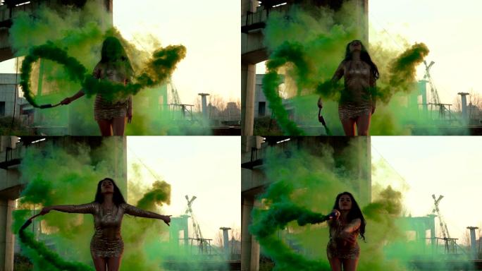 女子在绿色的烟雾中翩翩起舞