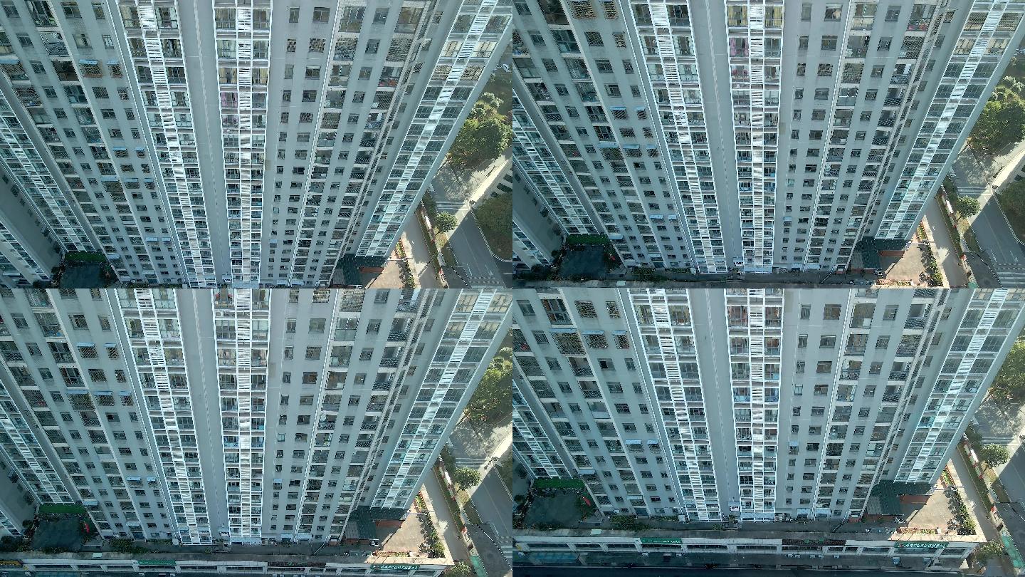 4K高层住宅从楼顶下降航拍空镜