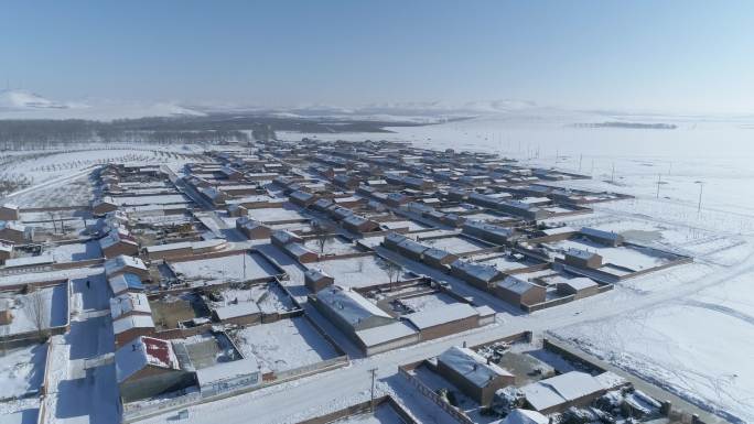 冬季雪景下的村庄航拍空镜