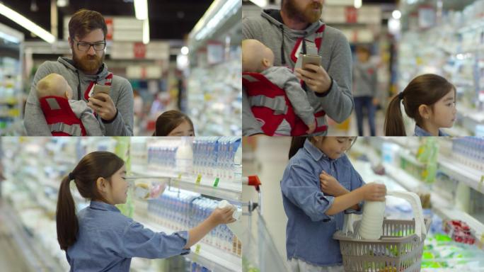 小女儿帮爸爸购物国外父亲可爱女孩超市购物