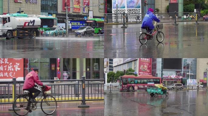 风雨中的行人车辆外卖小哥