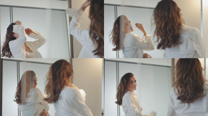 照镜子的女人是服装美女照镜子