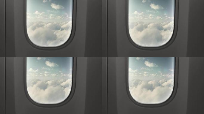 飞机机舱航班客机窗外蓝天白云高空飞行窗边