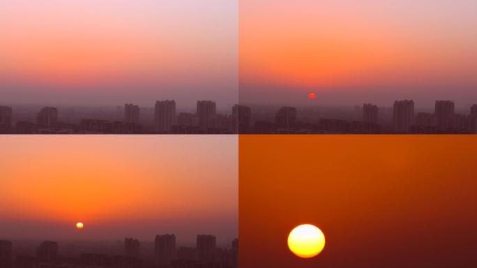 城市日出雾霾中的城市清晨黎明早晨的太阳