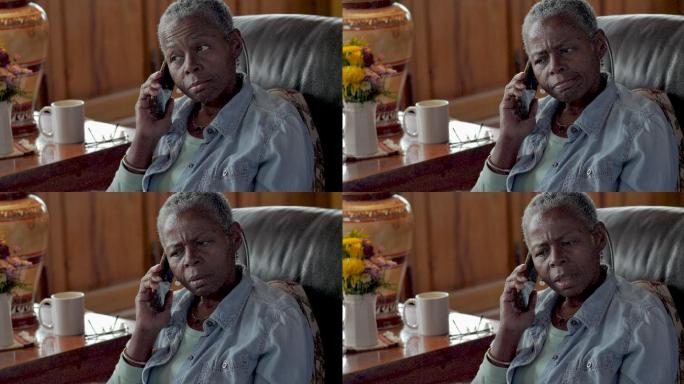 恼怒的老黑人妇女接她的手机