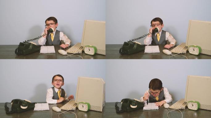 一个打扮成书呆子的小男孩坐在IT服务台旁