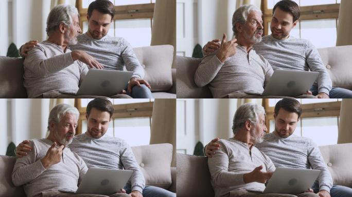 父亲用笔记本电脑和儿子聊天讨论在线新闻