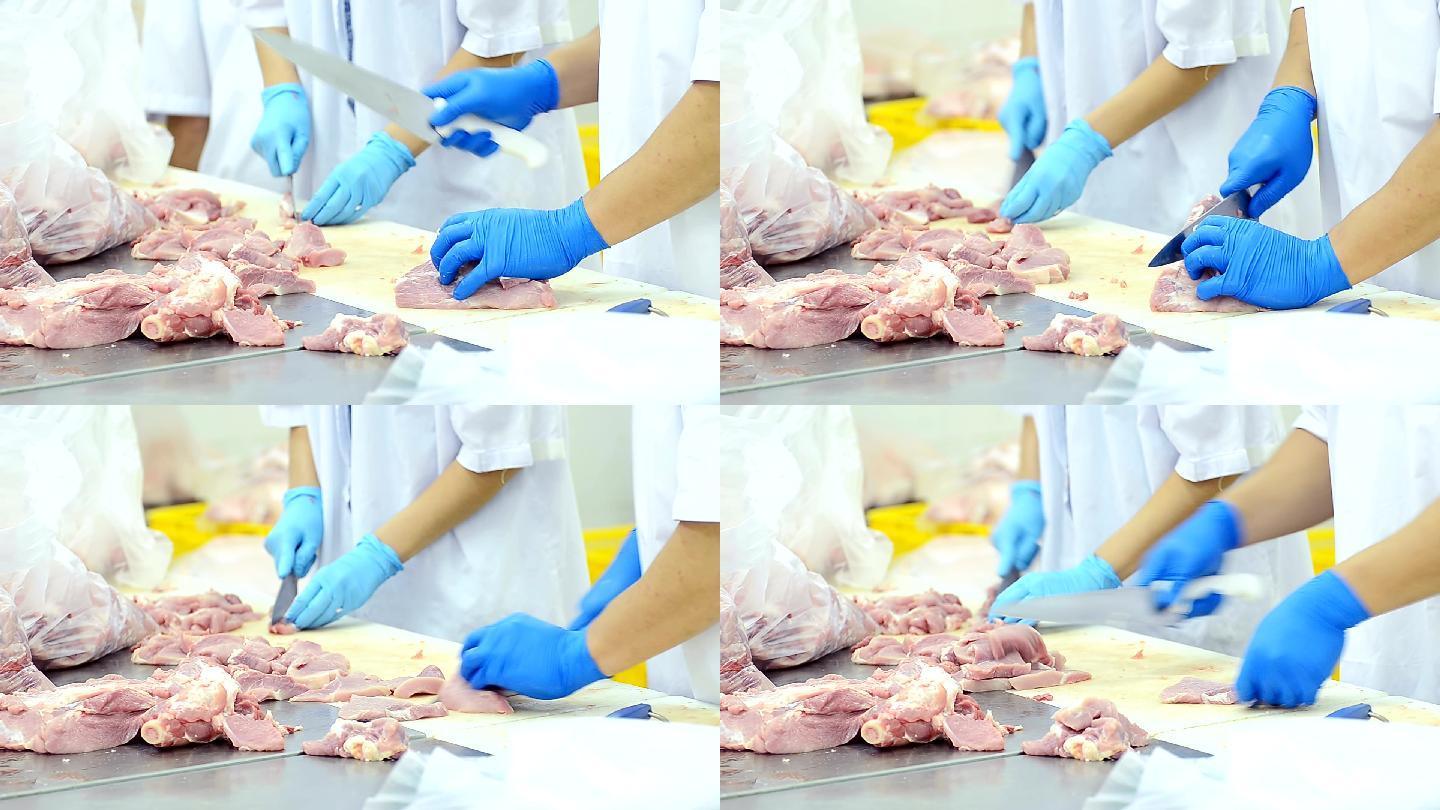 屠夫在猪肉厂的桌子上把猪肉剁碎切片
