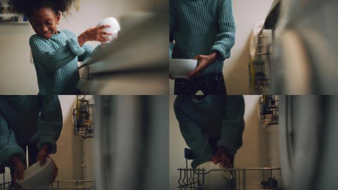 小女孩在家里用洗碗机洗碗