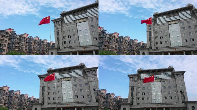 航拍鄱阳县税务局国旗飘扬