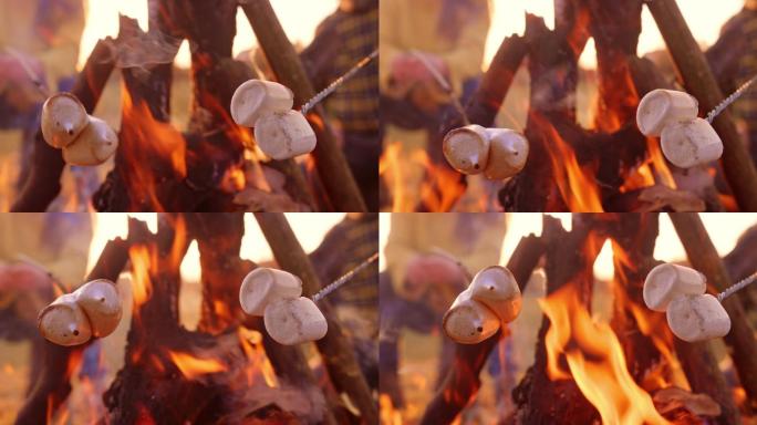 棉花糖在篝火上烘烤时融化