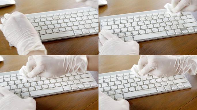 手清洁键盘特写清理洒扫反侦察犯罪现场