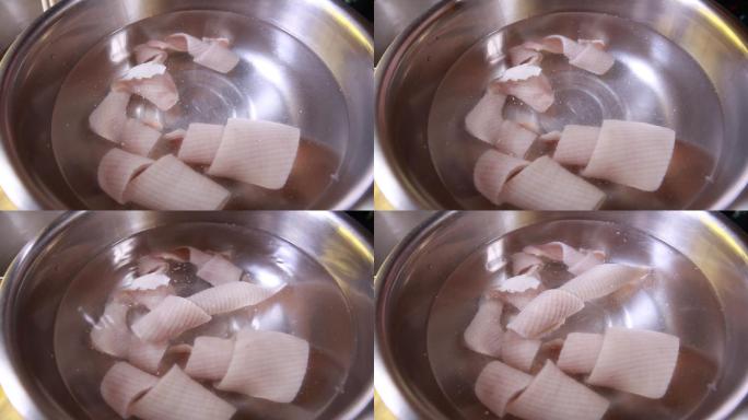 刮猪皮上脂肪浸泡去腥制作肉皮冻  (6)