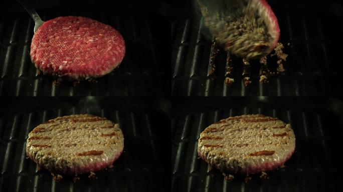 将牛肉在热烤盘上翻过来