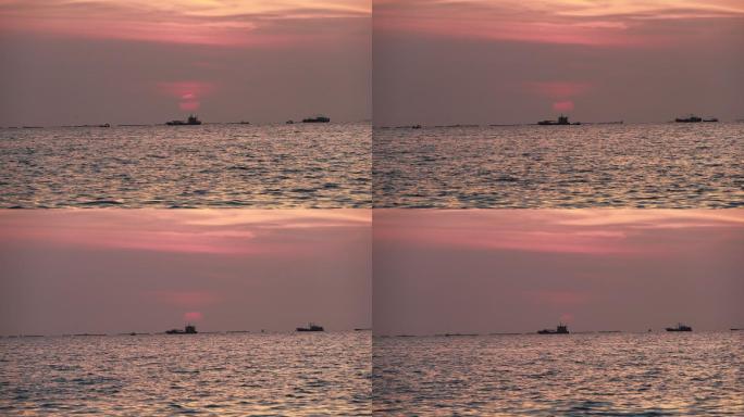 海边日落晚霞渔船夕阳2分钟固定机位拍摄