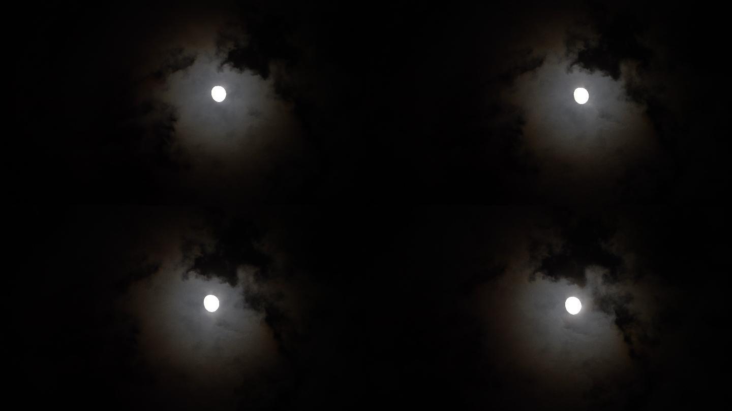 夜空圆月云动。月夜景色云彩流动天空之美