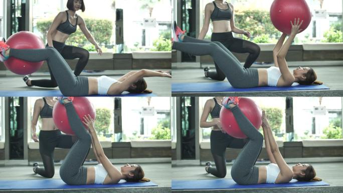 女人做腹肌训练室内人类肌肉鼓起肌肉