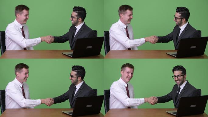 工作室拍摄两个人握手