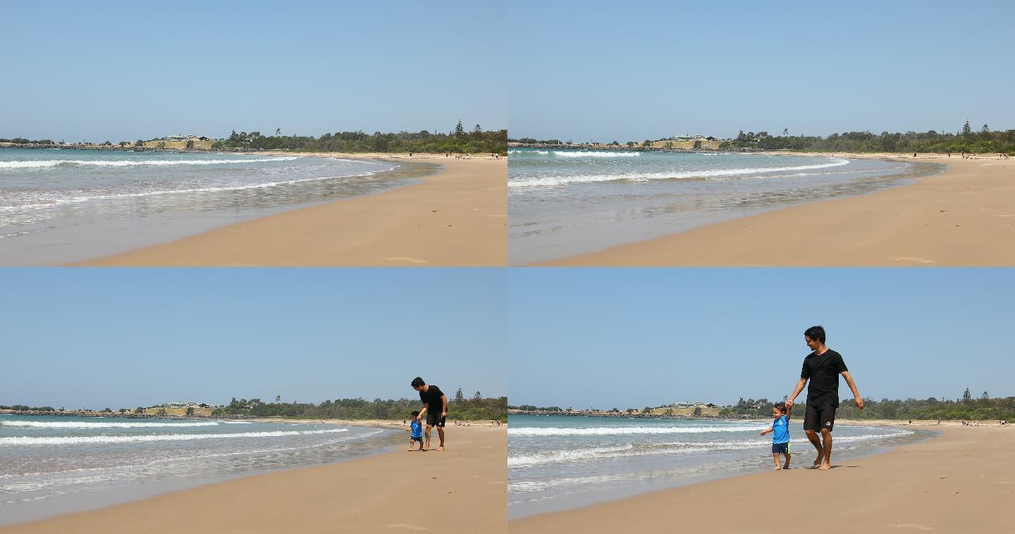 海滩上玩耍父子奔跑可爱
