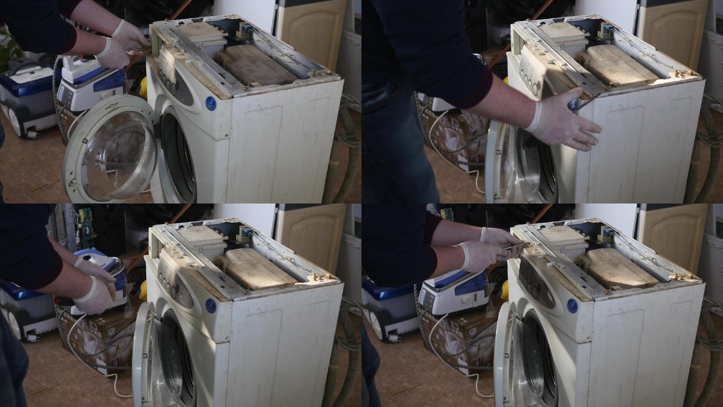 一个修理工正在拆卸洗衣机上的控制面板。