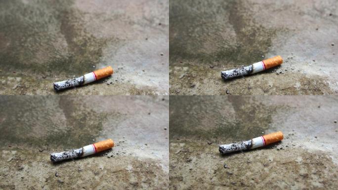 把地板上的香烟熄灭