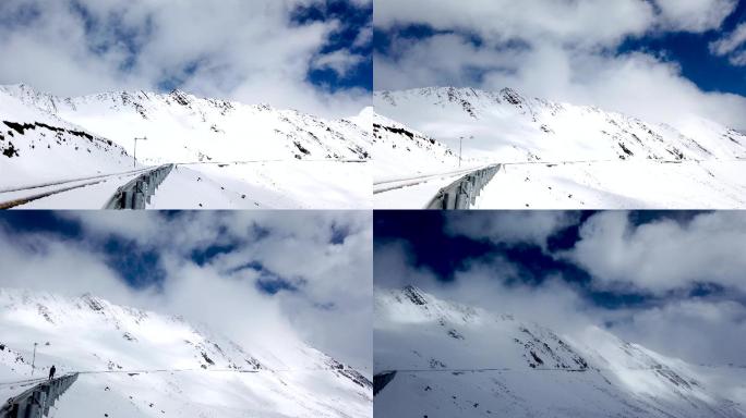 川西高原夹金山雪山雪景蓝天白云延时