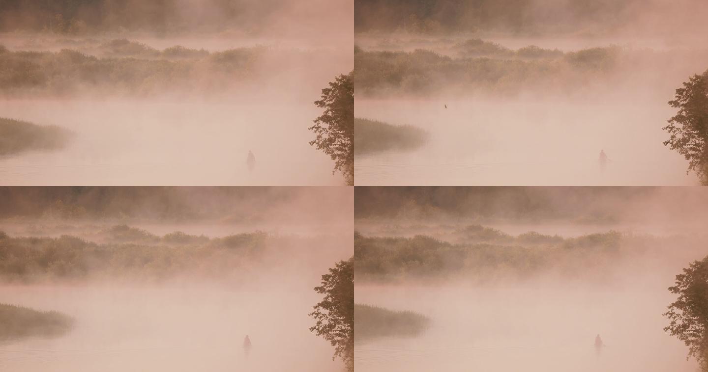 烟雾袅绕的湖面云雾云雾缭绕山水扁舟