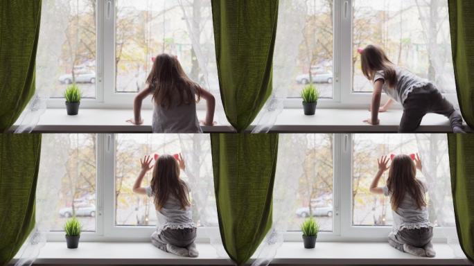 小女孩爬上窗台，望着窗外