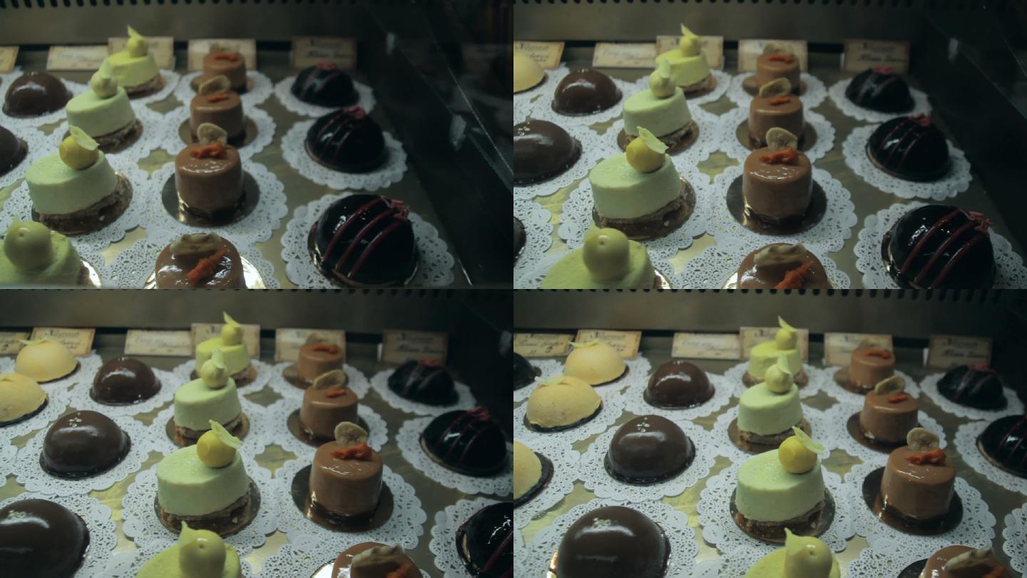 在橱窗展示食堂展示美味的甜点糕点