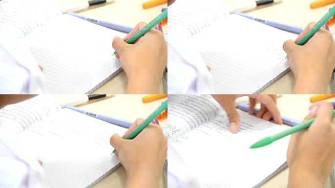 女孩在写纸条视频素材学校宣传片教室复习作