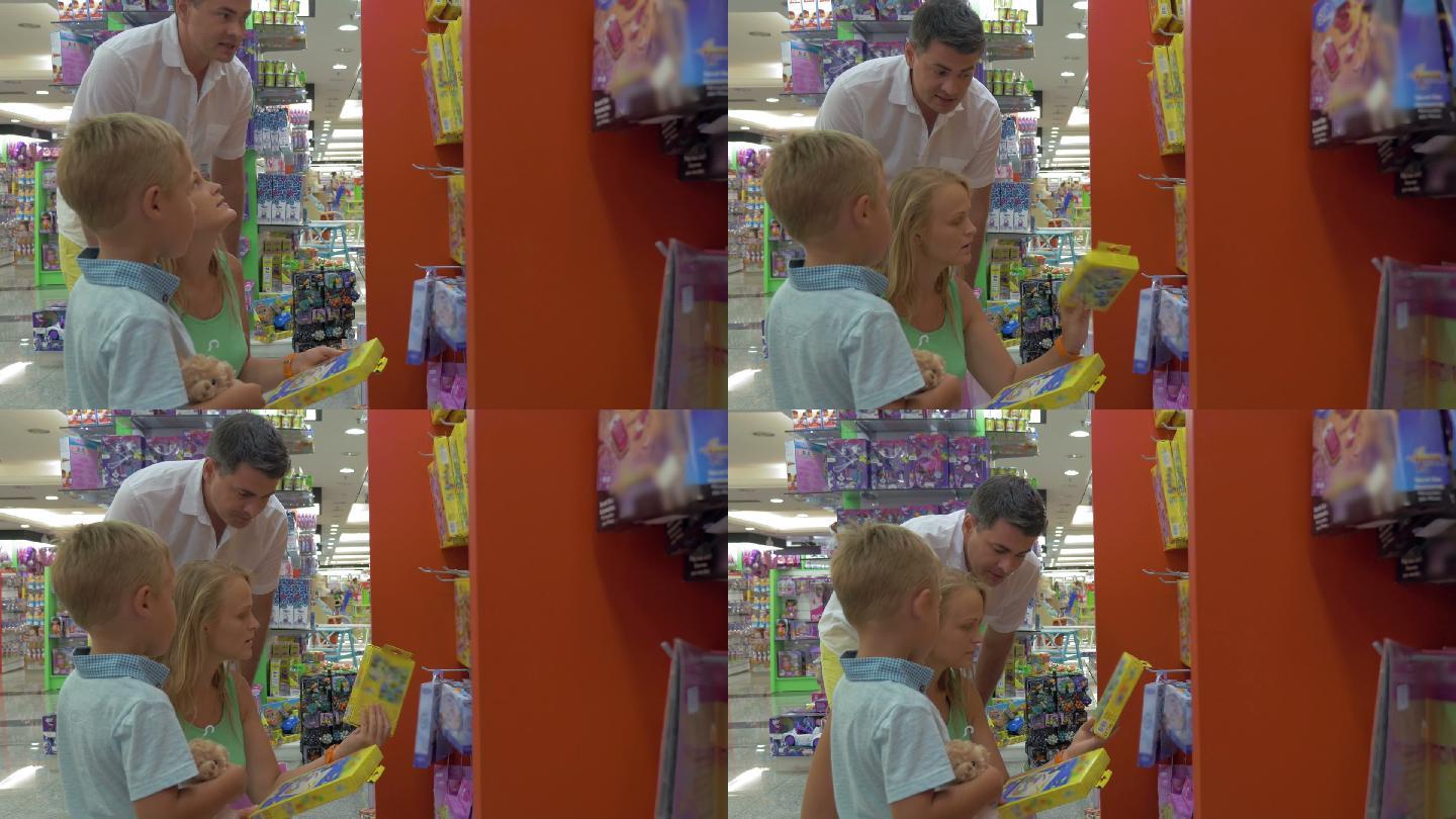 父母和孩子在超市的玩具区
