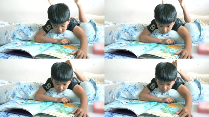 男孩在卧室看书眼睛视力躺着看书儿童看书
