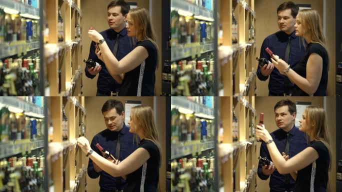 男人和女人在商店里挑选一瓶葡萄酒