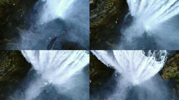 在冰岛冬天的瀑布水流水天一色山泉水
