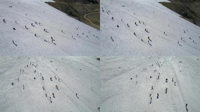 西藏廓琼岗日冰川雪山坡道上的游客空镜头